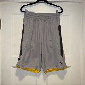 Nike Jordan Men’s Gray Athletic Shorts with Yellow Trim